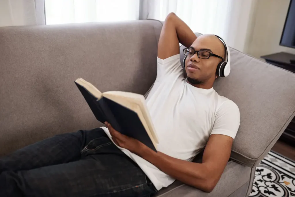 A man reading a book. 